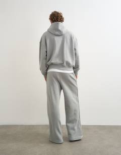 Model wearing Premium wide leg heavyweight full side zip jogger in grey marl