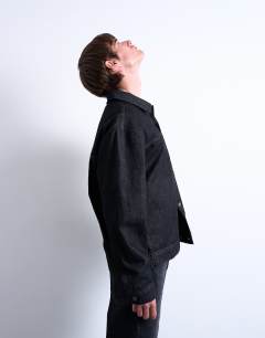 Model wearing Raw denim jacket in black