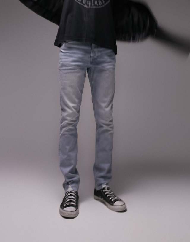 Topman raw hem stretch skinny jeans in bleach