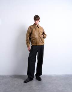 Model wearing Real leather double pocket coat in tan