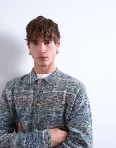 Model wearing Regular fit button polo with space-dye knit in multi