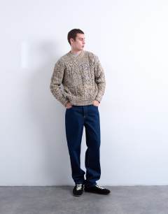 Model wearing Regular fit cable knitted jumper in yellow twist