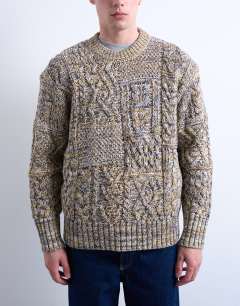 Model wearing Regular fit cable knitted jumper in yellow twist