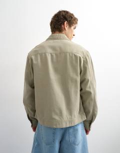 Model wearing Regular fit canvas overshirt in putty