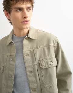 Model wearing Regular fit canvas overshirt in putty