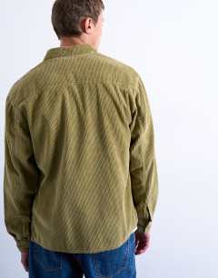 Model wearing Regular fit cord shirt in washed green