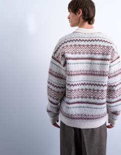 Model wearing Regular fit fairisle stripe knitted polo in ecru