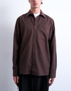 Model wearing Regular fit flannel shirt in brown