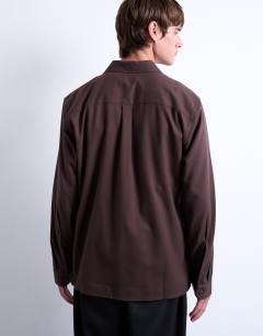 Model wearing Regular fit flannel shirt in brown