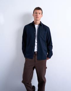 Model wearing Regular fit flannel shirt in navy