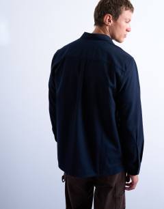 Model wearing Regular fit flannel shirt in navy