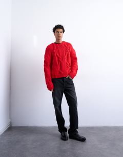 Model wearing Regular fit hand knitted jumper with cable in red