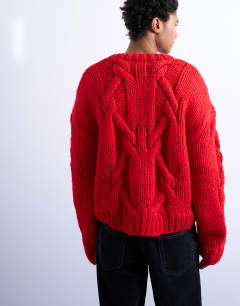 Model wearing Regular fit hand knitted jumper with cable in red