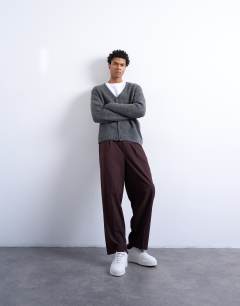 Model wearing Regular fit knitted cardigan in charcoal