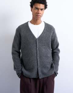 Model wearing Regular fit knitted cardigan in charcoal