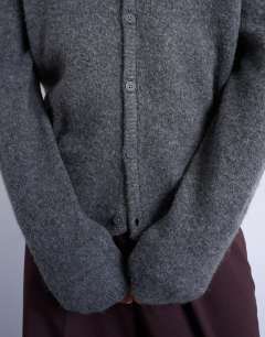 Model wearing Regular fit knitted cardigan in charcoal