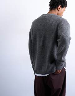 Model wearing Regular fit knitted cardigan in charcoal