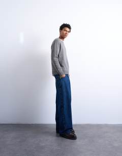 Model wearing Regular fit knitted crew neck jumper with wool in grey