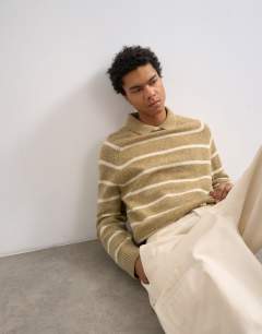 Model wearing Regular fit knitted crewneck polo with stripe marl in brown