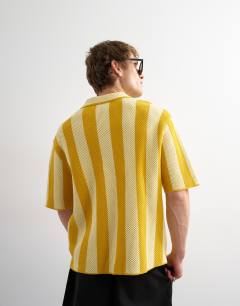 Model wearing Regular fit knitted texture stripe shirt in yellow