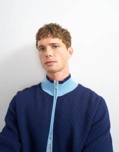 Model wearing Regular fit knitted track cardigan in blue