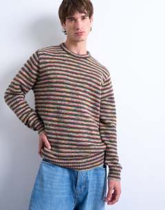 Model wearing Regular fit knitted twist stripe jumper in khaki