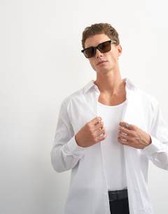 Model wearing Regular fit long sleeve formal stretch shirt in white