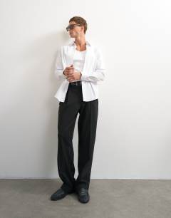 Model wearing Regular fit long sleeve formal stretch shirt in white