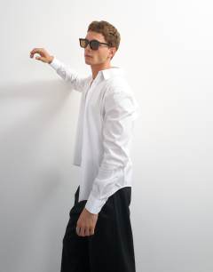 Model wearing Regular fit long sleeve formal stretch shirt in white