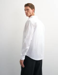 Model wearing Regular fit long sleeve formal stretch shirt in white