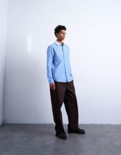 Model wearing Regular fit long sleeve formal stripe shirt with contrast collar in blue