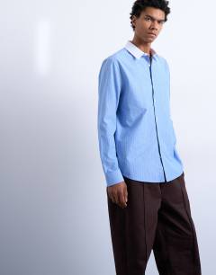 Model wearing Regular fit long sleeve formal stripe shirt with contrast collar in blue
