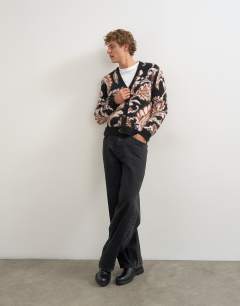 Model wearing Regular fit paisley brushed knitted cardigan in black