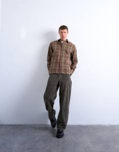 Model wearing Regular fit poplin check shirt in green