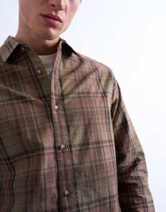 Model wearing Regular fit poplin check shirt in green