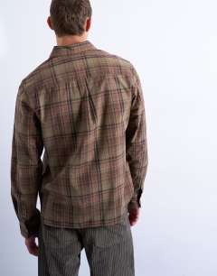 Model wearing Regular fit poplin check shirt in green