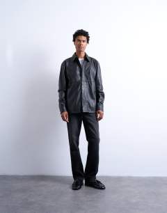 Model wearing Regular fit real leather shirt in black