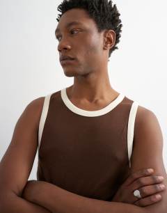 Model wearing Regular fit ringer vest in brown