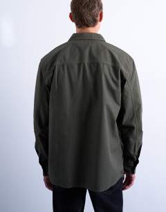 Model wearing Regular fit ripstop overshirt in washed khaki