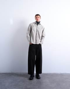 Model wearing Regular fit ripstop overshirt in washed stone