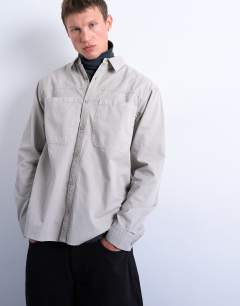 Model wearing Regular fit ripstop overshirt in washed stone