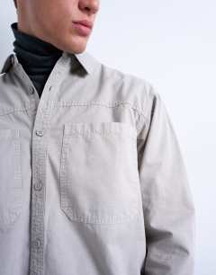 Model wearing Regular fit ripstop overshirt in washed stone