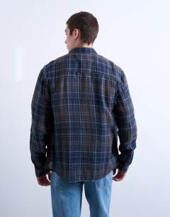 Model wearing Regular fit sheer check shirt in navy