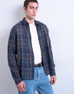 Model wearing Regular fit sheer check shirt in navy