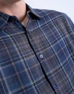 Model wearing Regular fit sheer check shirt in navy