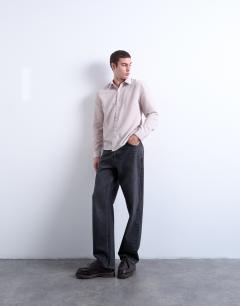 Model wearing Regular fit sheer stripe shirt in stone