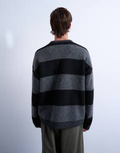 Model wearing Regular fit stripe crew in black and charcoal