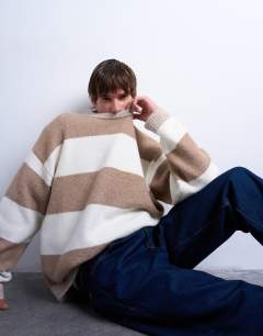 Model wearing Regular fit stripe crew in stone and brown