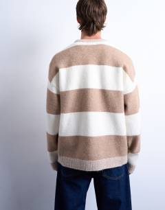 Model wearing Regular fit stripe crew in stone and brown