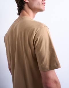 Model wearing Regular fit t-shirt in dark stone